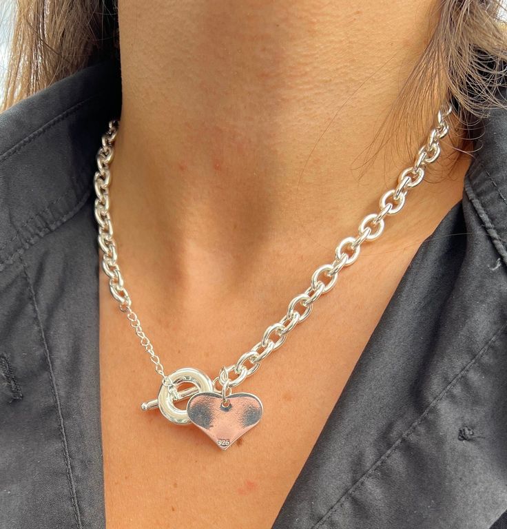 A beautiful solid sterling silver heart necklace, this necklace has rhodium on for the shiny apperance. It is 50cm in length and handmade accordingly. Please let me know if you have further questions 🤗 Silver Heart Chain Necklace With Heart Charm, White Gold Heart Necklaces With Sterling Silver Clasp, Silver Chain Necklace With Heart Charm, Heart Shaped Sterling Silver Necklace, Silver Heart Charm Chain Necklace With Heart Pendant, Silver Heart Necklace With Sterling Silver Clasp As Gift, Silver Heart Pendant Sterling Silver Necklace, Silver Double Heart Necklace With Heart Charm, Silver Heart Charm Necklace For Valentine's Day