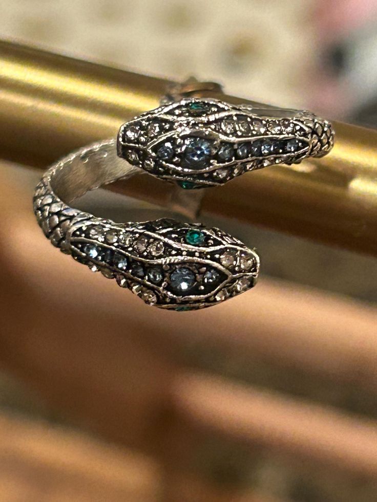 Adjustable snake ring with green crystals. Very trendy and definitely makes a statement. Beautiful piece. Comes packaged beautifully ready for gifting! Snake Rings, Snake Ring, Green Crystals, Green Eyes, Statement Ring, Rings Statement, Statement Rings, Beauty Book, Jewelry Rings