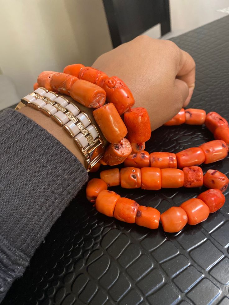 This Coral Beaded set is made with original Coral Stones. Coral Round Beads Bracelets For Beach, Coral Round Beads Bracelet For Beach, Coral Round Beaded Bracelets For Beach, Coral Beaded Bracelets For Gifts, Coral Red Beaded Bracelets As Gift, Red Coral Gemstone Beaded Bracelets, Elegant Coral Beaded Bracelets, Orange Polished Beads Bracelet, Orange Large Beads Bracelet