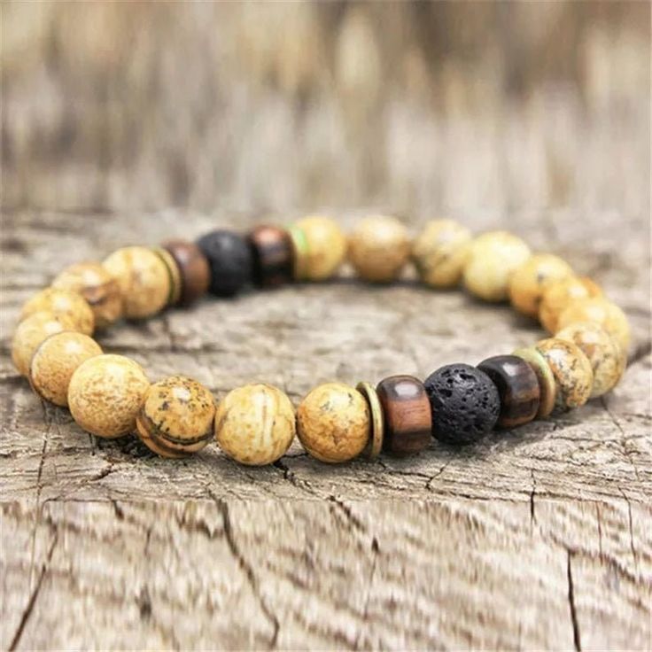 Stunning Tibetan Wooden Beaded Chakra Bracelet for Men. Good luck and spiritual Healing bracelet. Yoga and Meditation bracelet. This bracelet is beautifully hand crafted using quality beads. Spiritual Brown Gemstone Beads Bracelets, Spiritual Brown Bracelets With Gemstone Beads, Spiritual Brown Gemstone Beaded Bracelets, Spiritual Brown Beaded Bracelets With Gemstone Beads, Brown Braided Bracelets With 8mm Beads, Traditional Brown Beaded Bracelet With Natural Stones, Traditional Brown Beaded Bracelets With Natural Stones, Brown Natural Stones Bracelet For Meditation, Spiritual Brown Braided Bracelets With Natural Stones