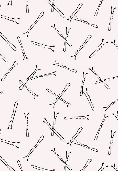 black and white drawing of sticks on a pink background