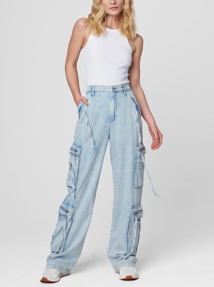 These almost-denim cargos are the perfect addition to your spring wardrobe! Smooth to touch and comfortable to wear, the loose fit and flowy design make them versatile enough to wear on the town or while lounging at home. The 4 side zippered pockets add functionality and create an edgy style! Pair it with the Love Letter Cami Ivory for a relaxed yet chic look. Composition & Fit: Cargo Style Functional Zip Pockets High Waisted 72% Cotton / 28% Lyocell Machine Wash Cold Love Letter Cami, Denim Cargos, Tencel Pants, Tencel Denim, Flowy Design, Edgy Style, Cargo Style, Cargo Pocket, Blank Nyc