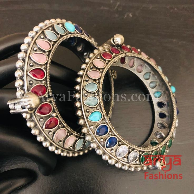 Multicolor Ethnic Silver Oxidized Bracelet/ Ethnic Bracelet /Boho Jewelry/Ethnic Oxidized Silver Bracelet Kada- Available Size: 2.4. Can fit size 2.6 due to openable feature.- Silver Oxidized Bracelet with simulated stones and stones in silver finish.- Very Elegant and stylish, this bracelet can be paired with any Attire depending upon the occasion and the theme. - The base is pure brass (90%) and pure 92.5 silver (10%) which makes this very sturdy and of good quality. - 100% guarantee on the po Silver Braclate, Oxidized Bangles, Oxidized Bracelet, Oxidized Silver Bracelet, Elephant Theme, Silver Elephant, Bangles Indian, Silver Elephants, Bracelet Boho