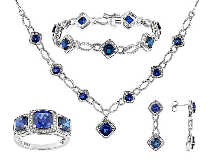 18.39ctw Square Cushion Lab Created Blue Sapphire And 0.02ctw Round White Diamond Rhodium Over Brass Necklace, Bracelet, Ring And Earring Jewelry Set. Necklace Measures Approximately 18"L x 0.99"W With Lobster Clasp Closure. Bracelet Measures Approximately 7.25" x 0.42"W With Box Clasp Closure And Safety Lock. Ring Measures Approximately 0.89"L x 0.44"W. Not Sizeable. Dangle Earrings Measure Approximately 1.25"L x 0.43"W With Pushbackings. Valentines Special, Diamond Jewelry Set, Lock Ring, 3 Stone Ring, Dream List, Jtv Jewelry, Link Earrings, Ring Earring, Box Clasp