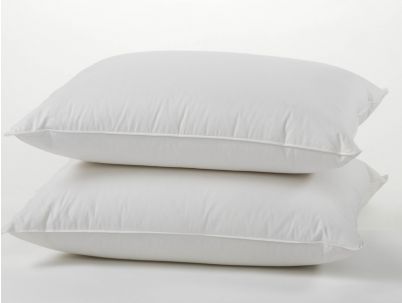 two white pillows stacked on top of each other