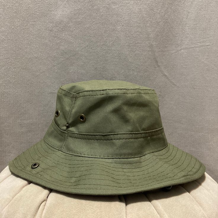 Elevate your outdoor adventures with our Green Safari Hat, a versatile and stylish accessory designed for those who love exploring the great outdoors. Whether you're hiking through rugged terrain, lounging on the beach, or embarking on a summer vacation, this hat has got you covered. Key Features: SAFARI-READY: Crafted with outdoor enthusiasts in mind, our Green Safari Hat is perfect for safaris, hikes, and all your outdoor escapades. SUN PROTECTION: Stay shielded from the sun's harsh rays with Adjustable Flat Brim Bucket Hat For Outdoor Activities, Adjustable Wide Brim Bucket Hat For Outdoor Activities, Adjustable Flat Brim Bucket Hat For Outdoor, Casual Bucket Hat With Flat Brim For Outdoor, Casual Flat Brim Bucket Hat For Outdoor, Outdoor Wide Brim Hat, Khaki Wide Brim Hat For Travel, Durable Short Brim Hat For Outdoor, Safari Hat With Short Brim For Outdoor