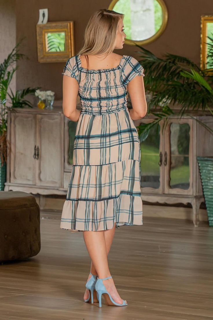 Trend Alert! The Olivia Dress features the hottest trend of the season: Smocked Bodice. This super feminine dress is lightweight and ideal for any spring and summer event! Color: Blue/Cream *Fit varies by brand. Always check Sizing Tab for reference. Details -A-line silhouette -Smocked bodice -Short sleeves Material and Care -100% Polyester -Lining 100% Polyester -Hand wash -Imported Casual Smocked Dress With Square Neck For Garden Party, Casual Smocked Dress For Garden Party, Casual Square Neck Sundress For Brunch, Summer Tiered Dress With Elastic Neckline, Casual Maxi Dress With Elastic Neckline For Brunch, Casual Maxi Dress With Elastic Neckline For Day Out, Casual Smocked Dress With Square Elastic Neckline, Casual Smocked Dress With Square Neck And Elastic Neckline, Casual Fitted Smocked Midi Dress