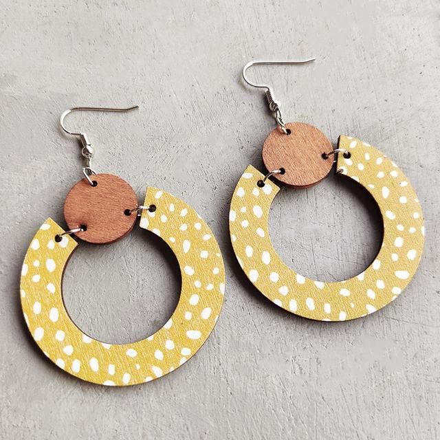 Add a touch of elegance to your outfit with our Beautiful Yellow Wood Circle Earrings. Crafted with care, these unique earrings are perfect for any occasion, featuring a soft and delicate yellow hue that adds a touch of femininity and sophistication to your look. 2 inches Yellow Wood, Wood Circles, Love Clothing, Bohemian Earrings, Modern Bohemian, Wood Earrings, Your Outfit, Spread Love, Circle Earrings