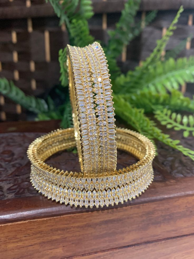 American diamond bangle in gold plated and clear stone. About one inch wide . Indian Jewellery Design Earrings, Fairy Jewelry, Indian Jewellery Design, Jewelry Design Earrings, Design Earrings, Diamond Bangle, Clear Stone, American Diamond, One Inch