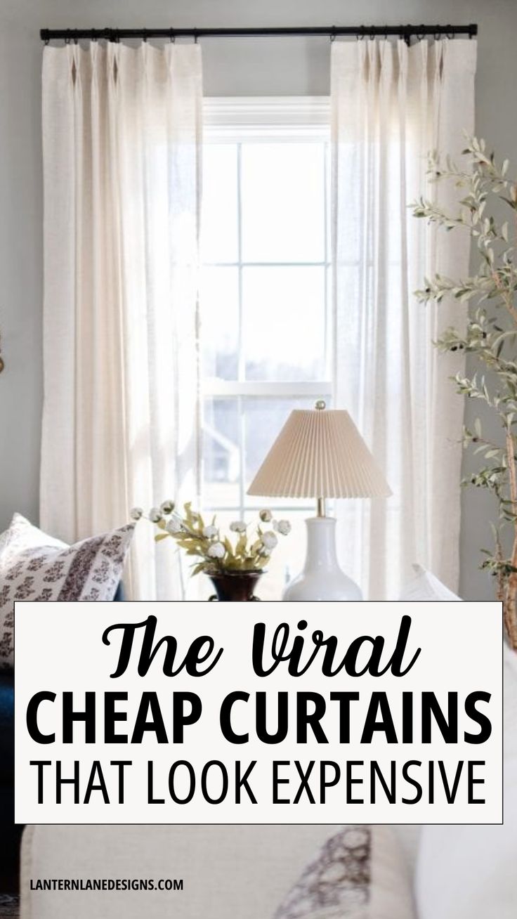 a living room with white curtains and the words, the visual cheap curtains that look expensive