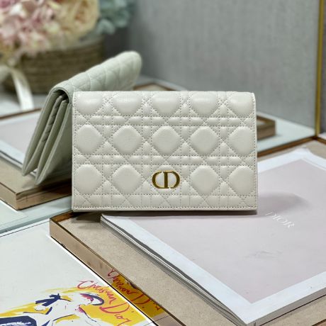 This Dior Caro wallet 'white'
Crafted from full leather inside and out, it's finished with our signature Cannage topstitching.
Put mobile phones, store bank cards, keychains...

'CD' logo on the front
2 compartments up and down
1 zipped pocket
10 card slots
Size: 19.5×13×2.5cm Modern White Leather Wallet, Luxury White Wallets With Interior Card Slots, Classic White Card Holder For Everyday, Luxury White Wallets For Everyday Use, Classic White Card Holder For Everyday Use, Classic White Card Holder For Daily Use, Classic White Card Holder With Card Slots, Luxury White Wallets With Card Slots, Classic White Bag With Card Slots