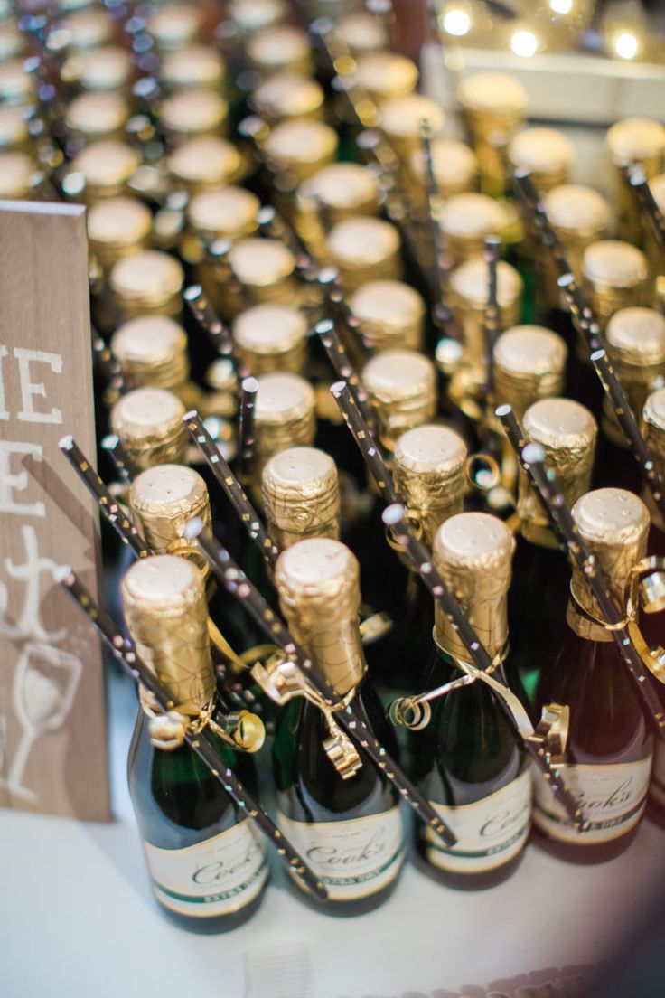 bottles of wine are lined up on a table