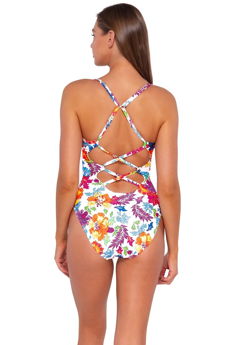 A sleek little one-piece is always the right answer. Our Veronica One Piece is perfect for lying by the pool or diving in; you'll want to take this bad boy on every summer trip. Featuring a double crossback, adjustable straps, and a low V-neck. Other features include a hidden shelf bra with picot elastic, removable cups, a J-hook that enables the straps to convert to a crossback, and matching lining. Adjustable One Piece: A classic one-piece with options to maximize your support and fit. Find Yo Summer One-piece With Adjustable Straps For Vacation, Summer Vacation One Piece With Adjustable Straps, Summer Vacation One-piece With Adjustable Straps, One Piece With Adjustable Straps For Summer Vacation, Beach Season One-piece Swimsuit With Adjustable Straps, One-piece Swimwear With Adjustable Straps For Beach Season, Beach Season One Pieces With Adjustable Straps For Poolside, White Strappy Back Swimwear For Poolside, White Swimwear With Crisscross Straps For Vacation