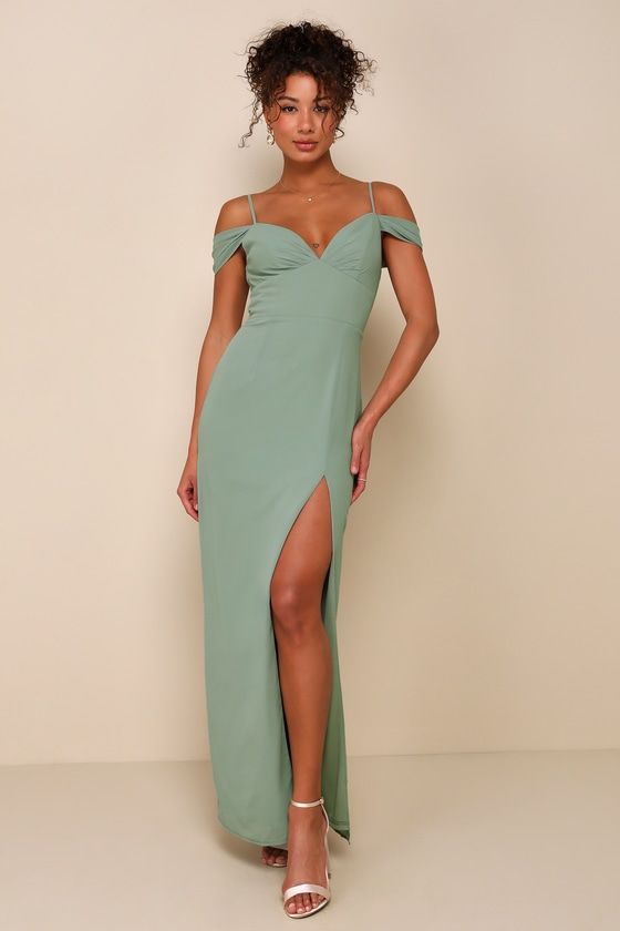 The Lulus Lovely Enchantment Sage Brush Cold-Shoulder Column Maxi Dress is exactly what you need to be the most elegant sight at any event! Lightweight woven chiffon shapes this gorgeous dress that features a lightly gathered bodice and a flirty V-neckline, supported by adjustable spaghetti straps and framed by pleated, off-the-shoulder sleeves that create a cold-shoulder effect. The flattering, set-in waist tops a figure-skimming column skirt that cascades down to a sweeping maxi hem with a sul 2024 Bridesmaid Dresses, Maid Of Honor Dresses, Sage Brush, Cold Shoulder Gown, Column Skirt, Lulu Fashion, Bridal Party Dresses, Chiffon Gown, Maxi Dress Green