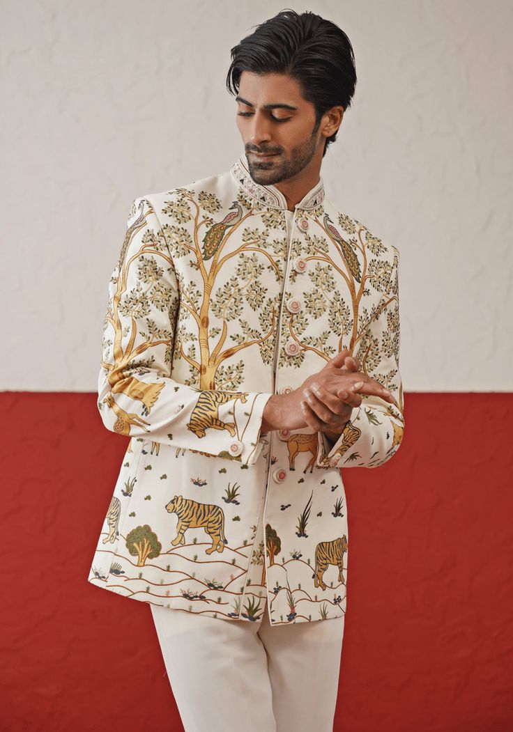 Step into sophistication with the Off White Jodhpuri suit. Crafted from georgette, the suit features a stunning multi-color resham and sequin work. The handwork on the collar and buttons adds an extra touch of elegance. Perfectly paired with matching pants. Perfect for special occasions like Sangeet, Mehendi, Haldi, or as a wedding guest outfit. Composition : Jodhpuri Jacket & Pant : Viscose Georgette Care: Dry Clean Only and Vacuum Storage This product can be customized for sleeves, length and White Jodhpuri, Jodhpuri Suit, Vacuum Storage, Indian Wedding Wear, Men Stylish Dress, Matching Pants, Asian Inspired, South Asian, Guest Outfit