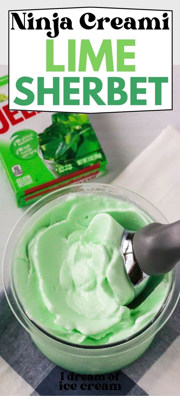 a bowl filled with green cream next to a box of ice cream and a spoon