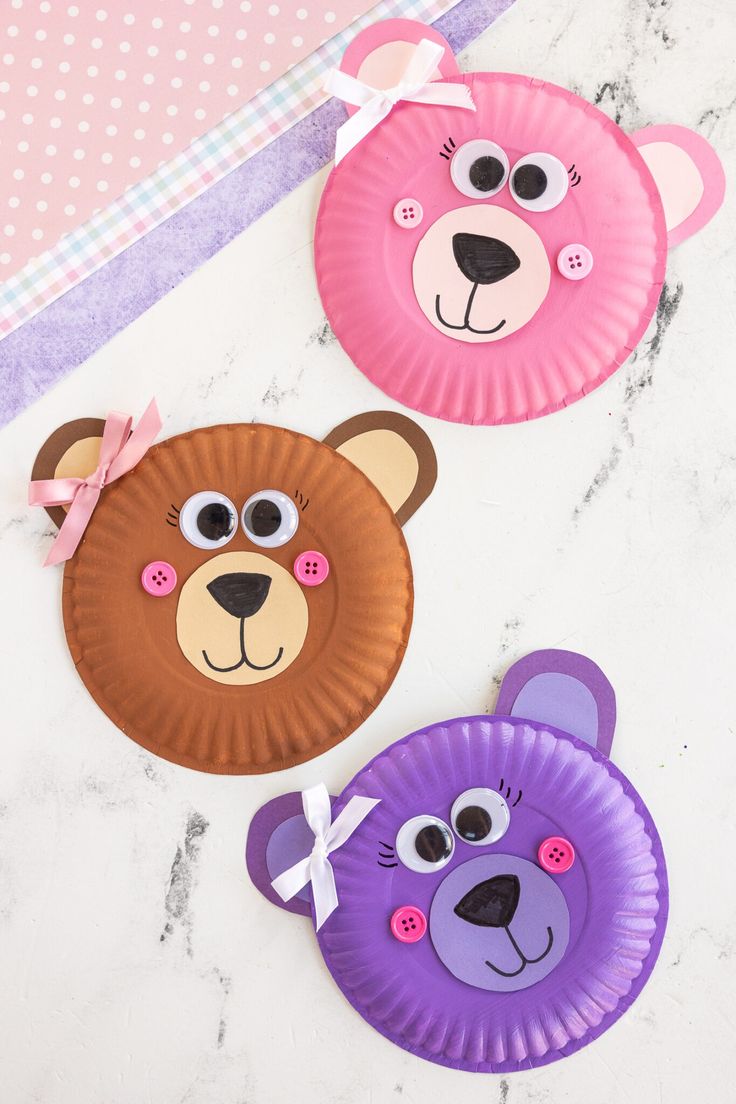 three paper plates shaped like teddy bears on a table