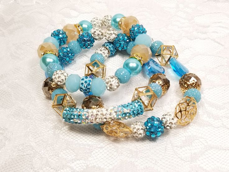 Beads of assorted sizes and shapes in shades of aqua and gold will surely glam up the day! Measurements: 7 in Light Blue Beaded Jewelry For Party, Handmade Turquoise Beaded Bracelets For Party, Elegant Turquoise Beaded Bracelets For Party, Blue Beaded Bracelets With Spacer Beads For Party, Turquoise Beaded Crystal Bracelet For Party, Blue Beaded Festive Bracelet, Blue Beaded Bracelet For Festive Occasions, Light Blue Jewelry With Colorful Beads For Party, Adjustable Turquoise Crystal Bracelet For Parties