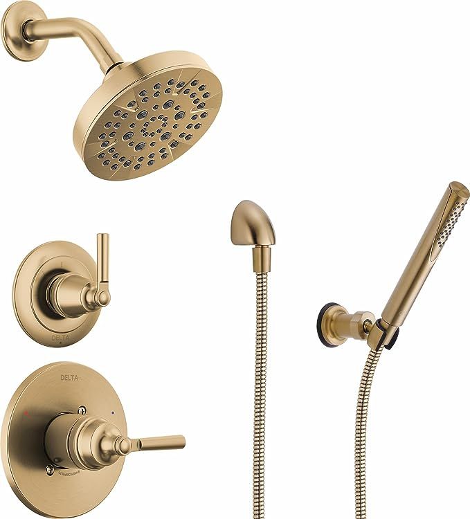 the shower faucet is shown in gold