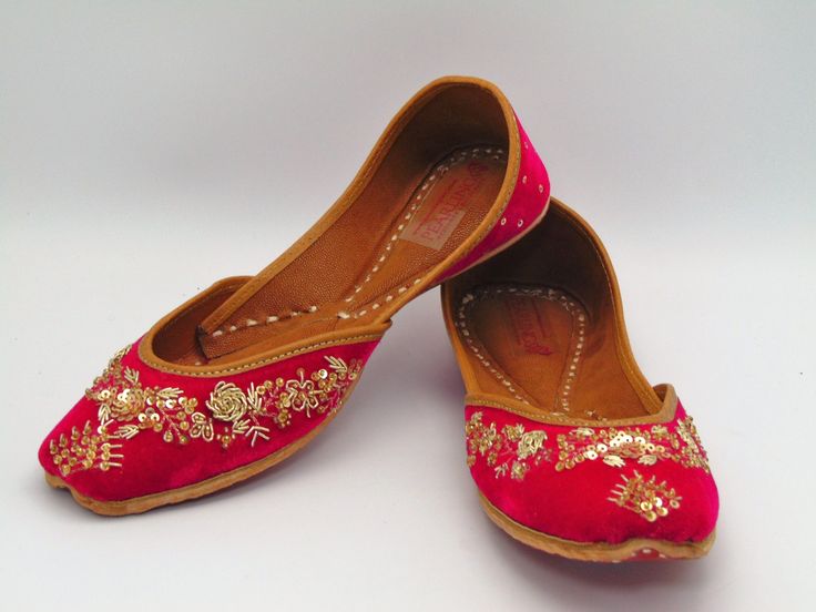 Ethnic Indian/Pakistani style shoes durable and hand stitched with genuine leather sole and leather padded cushion inside. these offer a lovely color of pink with gold design along the shoe. The pink velvet fabric embroidered with gold in zardozi work with gold sequence in a flower design with all around embroidery and perfect leather trimming to add to the style and comfort. They offer comfort and style, while still looking fabulous in these. Perfect or brides or everyday outfits. We offer many Summer Festive Slip-on Flats, Festive Summer Slip-on Flats, Embroidered Leather Flats With Flat Heel, Bohemian Embroidered Closed Toe Flats, Leather Embroidered Flats, Embroidered Leather Slip-on Flats, Handwork Flats For Summer Festival, Handwork Flats For Festive Summer Occasions, Summer Festival Flats With Handwork