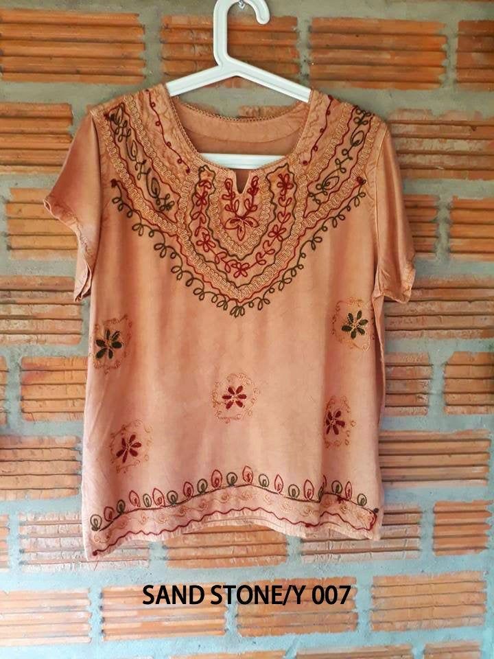 This Indian top made from 100% Polyester. Plain at the back. Very comfortable and cute Polyester Blouses from India. Perfect for any day Measurements, Bust 39 inches around. Length 22.5 inches. Sleeve 4.6 inches. CARE Hand wash for first fews time There is more colors please follow this link.https://www.etsy.com/your/shops/SpellMaya/tools/listings/stats:true/454318814 Summer Batik Print Top With Relaxed Fit, Bohemian Crew Neck Top For Festivals, Casual V-neck Top For Festivals, Summer Festival Top With Batik Print, Spring Batik Print Relaxed Tops, Spring Batik Print Relaxed Fit Tops, Relaxed Fit Cotton Tops With Batik Print, Traditional Brown Summer Tops, Casual Batik Print Tops With Relaxed Fit