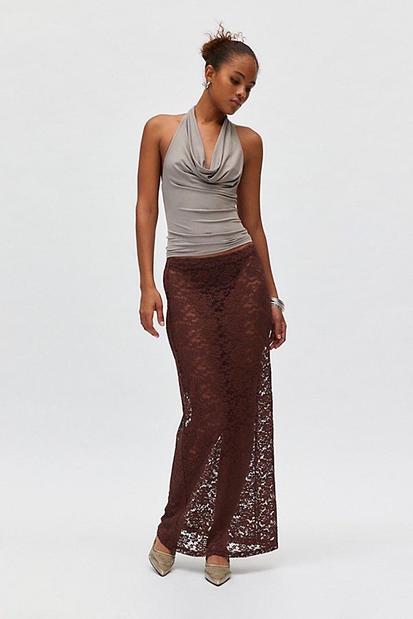 Modern minimal Lioness maxi skirt in a body-skimming, column silhouette. Designed in a sheer floral lace featuring a low-rise waistline for an effortless vibe. Features Lioness Black Swan sheer lace maxi skirt Low rise maxi skirt Sheer floral lace with stretch Low rise elasticated waistline Body-skimming fit Maxi length Unlined Easy pull-on style Content + Care 90% Nylon, 10% spandex Machine wash Imported Size + Fit Model in Brown is 5’11" and wearing size Small Measurements taken from size Small Length: 42.5" | Lioness Black Swan Sheer Lace Maxi Skirt in Brown, Women's at Urban Outfitters Low Rise Maxi Skirt, Lace Maxi Skirt, Sheer Clothing, Maxi Lace Skirt, Brown Fits, Womens Skirts, Lace Maxi, Black Swan, Sheer Lace