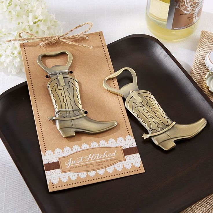 two bottle openers sitting on top of a tray