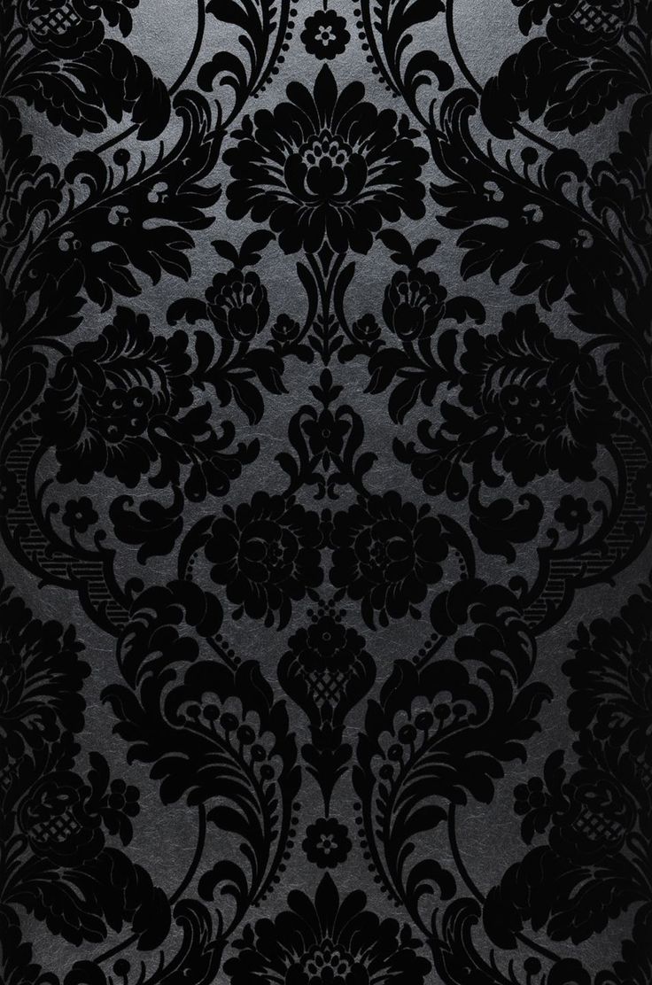 black and silver wallpaper with an ornate design