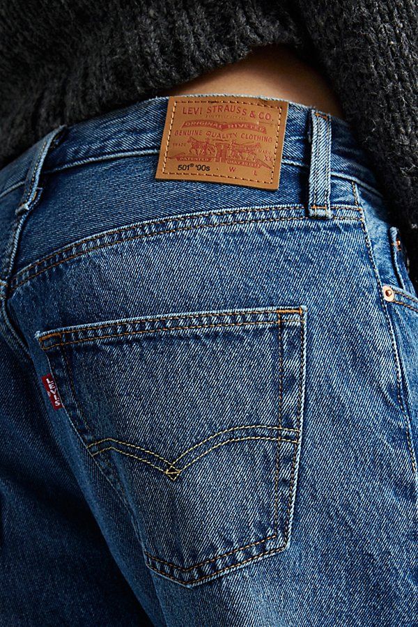 Effortless jeans from Levi’s® in a ‘90s inspired silhouette. Cut with a mid-rise and a baggy straight leg. Complete with a mini logo tab at the back pocket. Features Levi’s® 501 '90s jean Vintage straight jean Rigid non-stretch denim Mid-rise waistline Logo patch at the back waistband Straight leg fit Full length 5-pocket styling Zip fly and button closure Content + Care 100% Cotton Machine wash Imported Size + Fit Mid rise Straight leg Full length Model in Not My News Channel - Dark Wash is 5’9 Levis 501 Dark Blue, Levi Jeans Aesthetic, Levis 501 Women, 90s Jean, Levi 501, Levi Jeans Women, 90s Jeans, Classic American Style, Jean Vintage