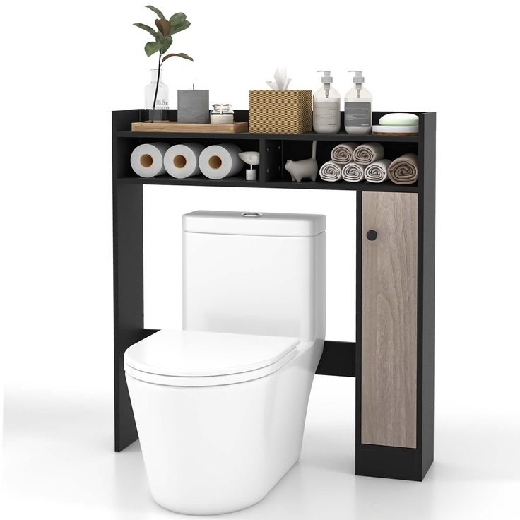 a white toilet sitting under a wooden shelf next to a plant and other bathroom items