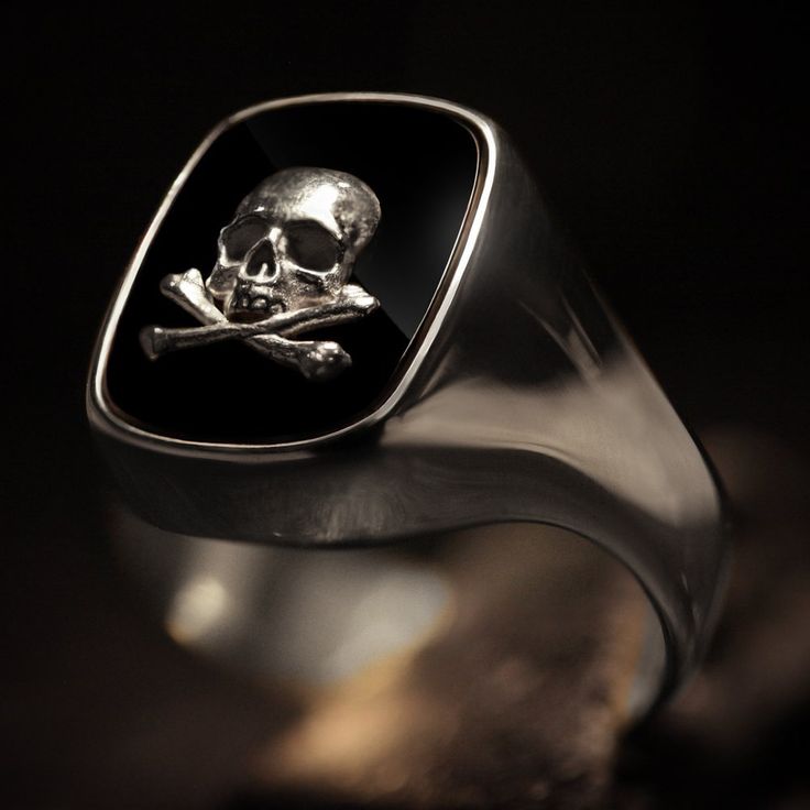 "Considered the \"gentleman's ring\", there doesn't seem to be a more perfect piece of jewelry to proudly wear than our sterling silver signet ring. Our Gentleman's ring is a very unique piece with a straight oval Onyx stone set within. On top of the Onyx sits a sterling silver skull and crossbones design. Shipping&Processing Since all our items are individually handmade, we need about 4 weeks (at most) to make your item. Shipping is on us, we use DHL express so it will only take 3 days on a Luxury Polished Skull Ring As Gift, Luxury Skull Ring With Polished Finish As Gift, Luxury Skull Ring With Polished Finish For Gift, Luxury Gold Signet Ring Collectible, 14k Gold Signet Ring With Polished Finish, Gold Hallmarked Signet Ring For Formal Events, Gold Signet Ring With Polished Finish For Collectors, Formal Gold Hallmarked Signet Ring, Luxury Hallmarked Signet Ring For Formal Occasions