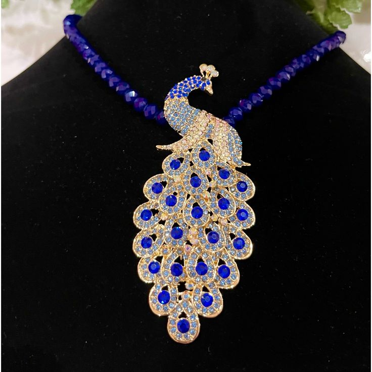 Beautiful Peacock Necklace Has A Combination Of Beads And Glass Crystals. The Beads And Crystals Help To Amplify The Magnificence Of This Pendant Necklace To Make It A Unique And Beautiful Piece Of Jewelry You Will Love. The Color Of The Beds Are Dark Blue. Large Crystals In Peacock Are Blue And The Small Ones Are Light Blue. The Light Makes It To Look Purple In Some Pictures. Brand New With Tags. Elegant Blue Peacock Design Jewelry, Trendy Silver Jewelry, Peacock Jewelry, Peacock Necklace, Candy Jewelry, Peacock Art, Beautiful Peacock, Amethyst Gem, Large Crystals