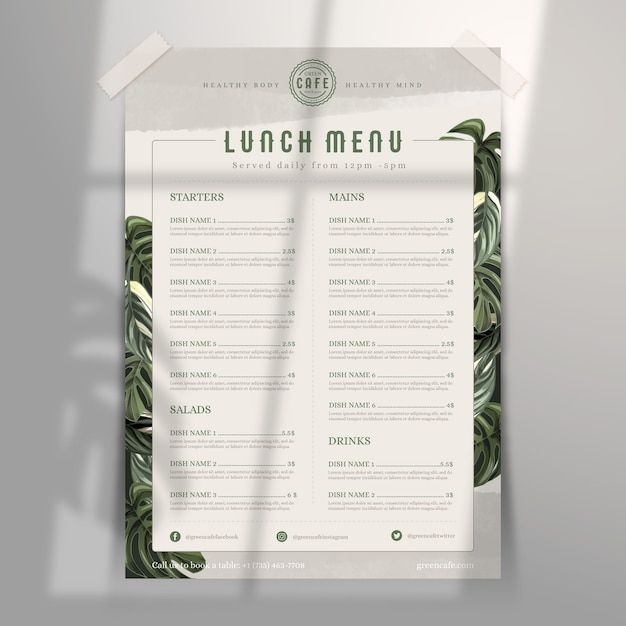 the lunch menu is designed with tropical leaves and green foliage, as well as a white paper