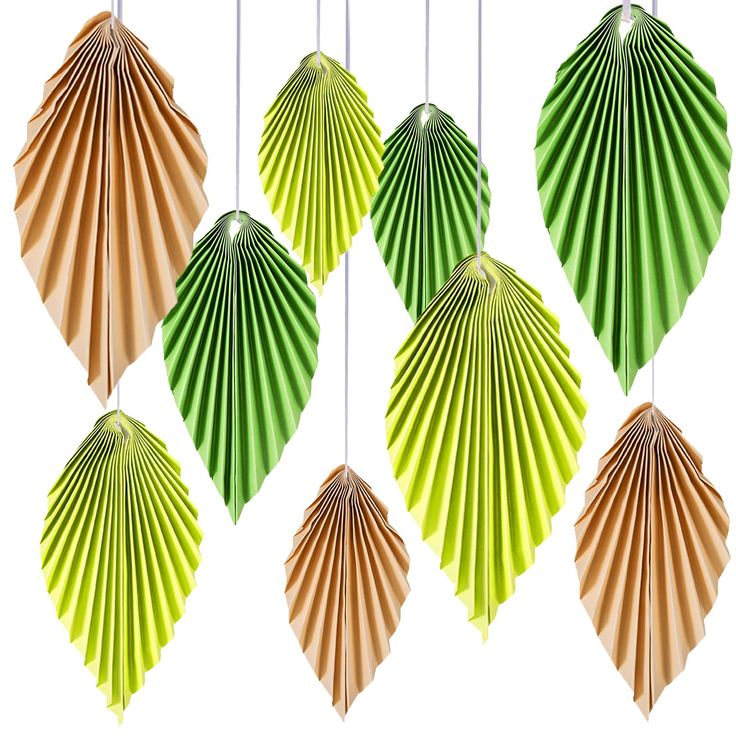 six green and brown paper fans hanging from strings