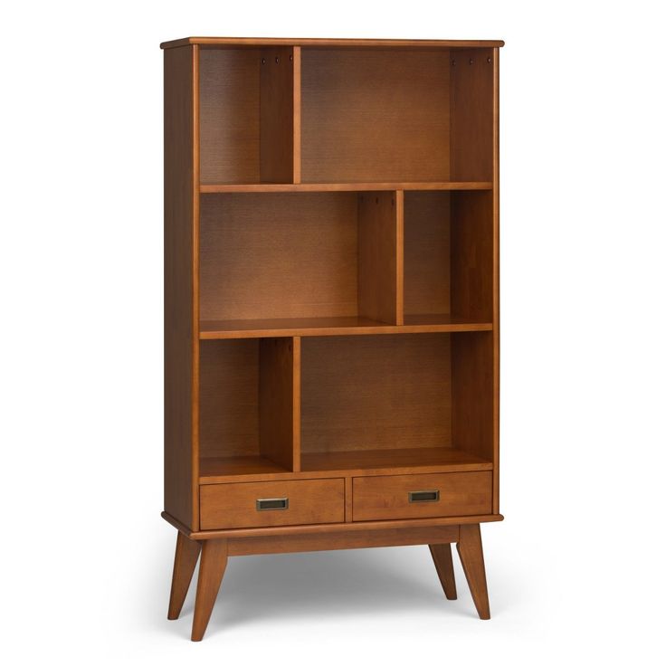 a wooden bookcase with two drawers on one side and an open drawer on the other