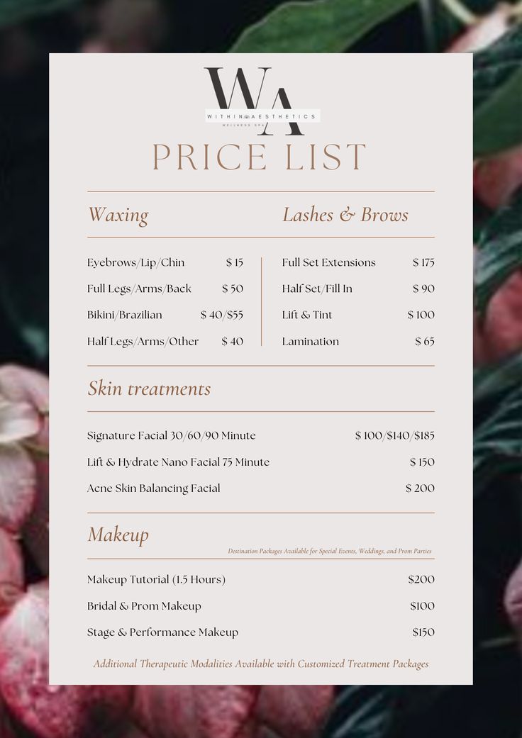 a price list with pink flowers in the background