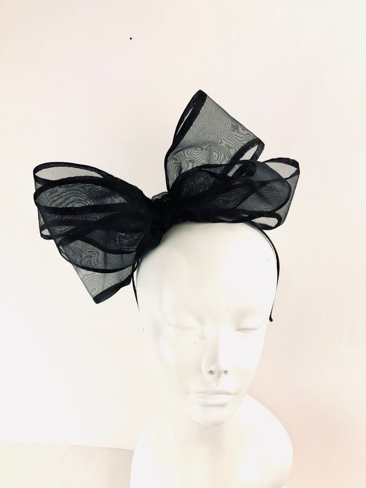 Black bow Fascinator - Bow Wedding Headpiece -chiffon and satin bow- Kentucky derby- Big bow Headband Hi, This triple bow headband has a handmade 4 inch chiffon with black satin edge. 10 inches long. It's sprayed with stiffener to hold its shape. Colors: Black Navy It's all placed on a 1/8 inch covered headband. This covered headband fits any head size and very comfortable. Plus no headaches! Pick a headband that matches Your hair color so it blends in. Light weight! For all ages...5 to 85 I am Fitted Tulle Headpieces For Parties, Adjustable Ribbon Bow For Party, Elegant Black Hair Accessories For Summer, Adjustable Party Fascinator With Satin Bow, Adjustable Ribbon Headpieces For Parties, Black Ribbon Bow For Evening, Fitted Bow Tie With Detachable Bow For Party, Spring Party Fascinator With Satin Bow, Spring Party Hair Accessories With Decorative Bow