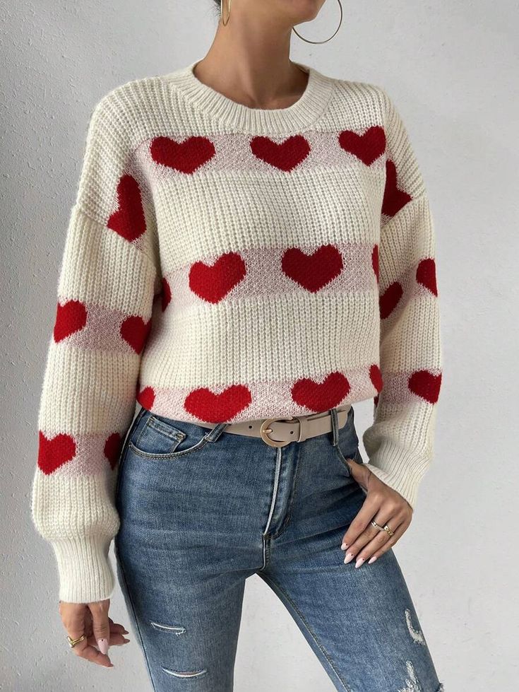 That SHEIN Frenchy Heart Pattern Drop Shoulder Sweater in white sounds like a perfect choice for Valentine's Day! The combination of striped and heart patterns adds a unique and playful touch to the sweater. With its long sleeves and regular length, it's perfect for a casual and comfortable look. Pair it with your favorite jeans or leggings, and you'll be ready to celebrate in style. Have a fantastic Valentine's Day! 💕👚 Red Long Sleeve Sweater For Valentine's Day, Red Long Sleeve Valentine's Day Sweater, Red Long Sleeve Sweater With Heart Print, Trendy Heart Print Sweater For Winter, Trendy Winter Sweater With Heart Graphic, Trendy Fall Sweater With Heart Print, Winter Heart-shaped Sweater With Heart Print, Winter Heart Print Sweater, Winter Heart Graphic Sweater