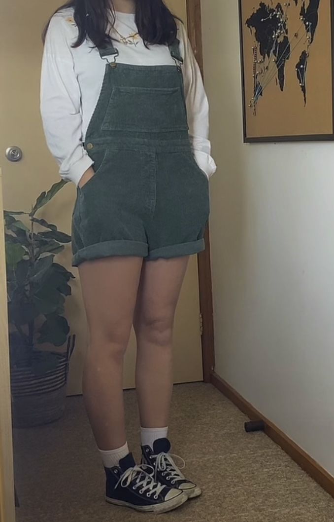 Green, overalls, cute, spring, fashion, inspiration, Inspo, fall fashion, converse, retro, cute Dark Green Overalls Outfit, Overall Shorts Outfit Midsize, Green Overalls Outfits Shorts, Short Overalls Aesthetic, Cute Green Outfits Casual, Green Short Overalls Outfit, Green Overall Shorts Outfit, Courdory Overalls Outfits, Noah Kahan Outfits