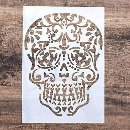 a white paper with a brown sugar skull on it