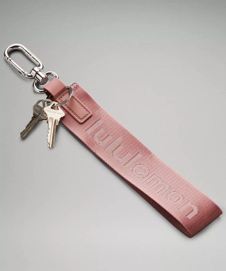 Never Lost Keychain | Unisex Bags,Purses,Wallets | lululemon Lulu Lemon Keychains, Rectangular Key Leash Bag Charm For Everyday, Trendy Bag Charm With Key Clip For Everyday Use, Pink Keychain With Key Clip For Everyday Use, Never Lost Keychain, Vehicle Decor, Shopping Spree, Car Keys, Christmas Wishlist