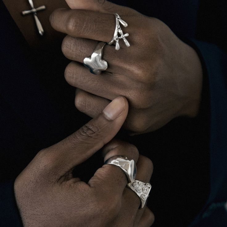 The Charlotte ring is a continuation of our generation of rings with pendants, such as the Erin, June, or Kira rings. This time, we have added a small handcrafted cross and two little drops on the side. The length of the cross is 14 mm, and the drops are 7 mm long. Material: Sterling Silver. The price is for one ring. Timeless Sterling Silver Drop Jewelry, Minimalist Sterling Silver Cross Ring, White Gold Teardrop Promise Jewelry, Sterling Silver Jewelry With Ring Detail For Promise, Modern Sterling Silver Jewelry From Collaboration, Minimalist Sterling Silver Teardrop Rings, Elegant Cross Jewelry For Promise, Sterling Silver Cross Ring For Promise, Silver Cross Jewelry For Promise