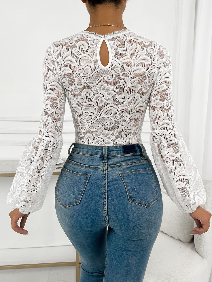 This Black Lace Ruffled Long Sleeve Bodysuit is the perfect mix of elegance and comfort. Crafted with fine lace and featuring a sleek and slim fit, this bodysuit is perfect for any special occasion. With its long sleeves and ruffled detail, you will be sure to stand out from the crowd! Cotton Imported Pull-On closure Hand Wash Only