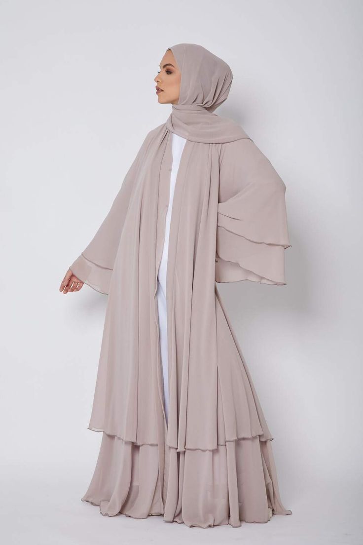 Fabric - Chiffon  Hijab is included  Belt is included  Pop up buttons allows you to wear the abaya open or closed  Model is wearing our 'White Inner Slip Dress' in a size 58  Model is UK size 8, height of 5'8 and wearing a size 58  Hand Wash Only Flowie Dress, Hijabi Formal, Pretty Abayas, Flowy Abaya, New Abaya Style, Open Abayas, Raya 2023, Abaya Fashion Dubai, Modest Clothes