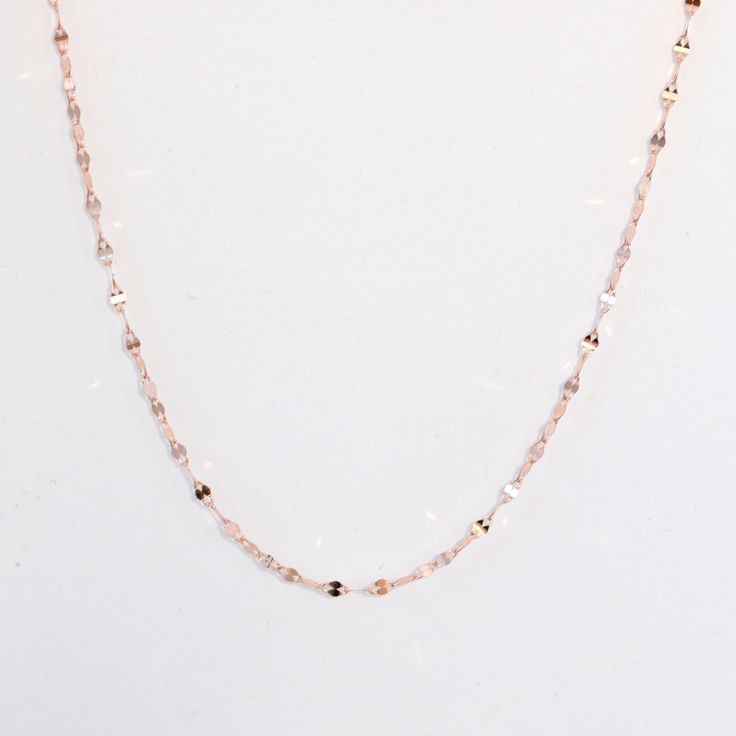 "A delicate link chain necklace with a shocking amount of sparkle. Made to last a lifetime and has an adjustable chain for easy layering. Wear it on its own or stack up multiple for the ultimate glitter. ✩ Handcrafted in 10K solid rose gold. Tarnish resistant, never discolor. ✩ Chain comes with a total of 16\" with options to wear at 14\", 15\" and 16\"    or a total of 18\" with options to wear at 16\", 17\" and 18\" ✩ Chain width: 1.7mm ✩ Approx. weight: 0.5g ✩ FREE gift box & Free domestic shipping More blings from Joylene: https://www.etsy.com/shop/joylenedesign *  Social media * Find us on Facebook: https://www.facebook.com/joylenejewelry/ Tag us on Instagram: joylenedesign" Cheap Adjustable Rose Gold Chain Necklace, Dainty Rose Gold Necklace With Paperclip Chain, Dainty Rose Gold Paperclip Chain Necklace, Delicate Rose Gold Chain Necklace For Party, Minimalist Rose Gold Chain Necklace, Rose Gold Necklace With Paperclip Chain For Gift, Delicate Rose Gold Chain Necklace, Minimalist Rose Gold Paperclip Chain Jewelry, Delicate Rose Gold Necklaces With Satellite Chain