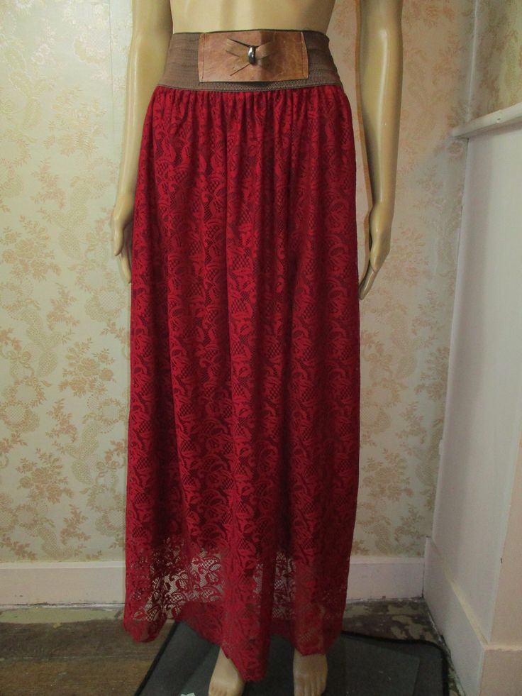 "Vintage lace maxi skirt with a brown elastic waist and a brown vynil bow.    The underskirt is maroon,  the lace top skirt is dark red. Waist flat;  15\" Length;  42\" Made in France synthetic" Summer Prom Long Skirt, Lace Lined Summer Maxi Skirt, Summer Lace Lined Maxi Skirt, Summer Lace Long Maxi Skirt, Fitted Summer Maxi Skirt For Prom, Fitted Maxi Skirt For Summer Prom, Summer Prom Fitted Maxi Skirt, Summer Maxi Skirt For Prom, Party Skirt With Lace Patchwork