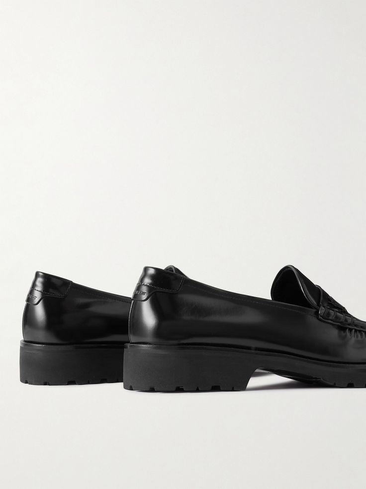 SAINT LAURENT's leather loafers have been crafted in Italy, set on thick rubber soles and appliquéd with a signature black metal logo on the penny bars. They're a classic design that goes equally well with a smart blazer or cool biker jacket. Italy Logo, Loafers For Men, Saint Laurent Shoes, 5 Inch Heels, Metal Logo, Monogram Logo, Lug Sole, Penny Loafers, Metallic Logo