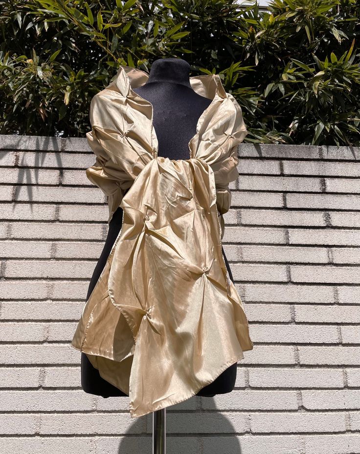 A very elegant light satin shawl for your wedding party or evening dress. Made of light organza, slightly sparkles on the sun or light. Color: champagne / beige / gold Size : 200 cm x 50cm approx You can use it as a wrap, shawl or stola. WE have matching bags in our Etsy Shop! WE accept credit cards! Silk Shawl Scarf For Party, Silk Shawl Scarves For Evening, Satin Dupatta For Party, Elegant Formal Satin Dupatta, Elegant Satin Dupatta For Formal Occasions, Elegant Silk Scarves For Wedding, Elegant Silk Shawl Traditional Drape, Elegant Shawl With Traditional Drape, Elegant Beige Scarf Wrap