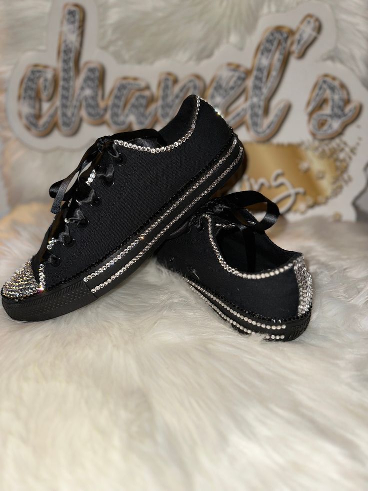 Custom Bling Converse All Star Chuck Taylor Sneakers. All designs handmade and embellished with a variety of high quality crystals. Great for weddings, proms, homecomings, birthdays, special events or just your everyday girly girl.  **IF YOU NEED THIS ITEM BEFORE THE PROJECTED SHIPPING TIME YOU MUST CONTACT US BEFORE ORDERING (additional charges may apply) ** Shoe Details: Classic black on black low top Converse All Star Chuck Taylor Sneaker (cloth material style) Shoe Size: WOMEN'S size 5 to si Party Sneakers With Bling, Black Embellished Party Sneakers, Black Bling Sneakers With Round Toe, Party Black Embellished Sneakers, Black Sneakers With Rhinestones And Round Toe, Party Sneakers Embellished Black, Black Party Sneakers With Glitter Accents, Sporty Black Sneakers With Rhinestones, Luxury Bling Custom Low-top Sneakers