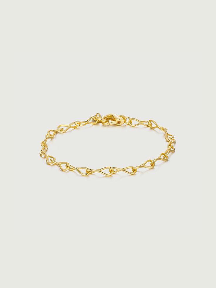 Twisted Figure 8 Bracelet Gold Cable Chain Bracelet For Formal Occasions, Modern Twisted Jewelry For Everyday, Formal Gold Bracelet With Cable Chain, Modern Twist Link Jewelry For Gift, Modern Twist Infinity-shaped Yellow Gold Jewelry, Modern Twist Everyday Bracelet Jewelry, Modern Twist Everyday Bracelet, Elegant Adjustable Chain Link Gold Bracelet, Elegant Adjustable Gold Chain Link Bracelet